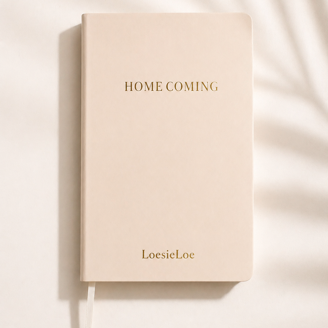 Homecoming notebook in A5 size with a soft cover, subtle golden details and ribbon bookmark.
