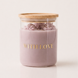 With Love mauve pink candle with golden lettering, hand-poured rose details and a wooden lid. Loesieloe