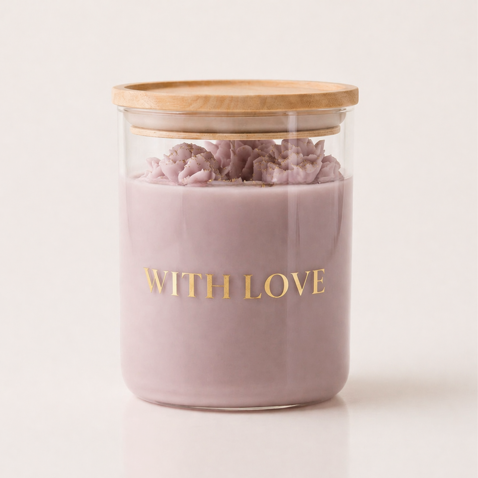 With Love mauve pink candle with golden lettering, hand-poured rose details and a wooden lid. Loesieloe